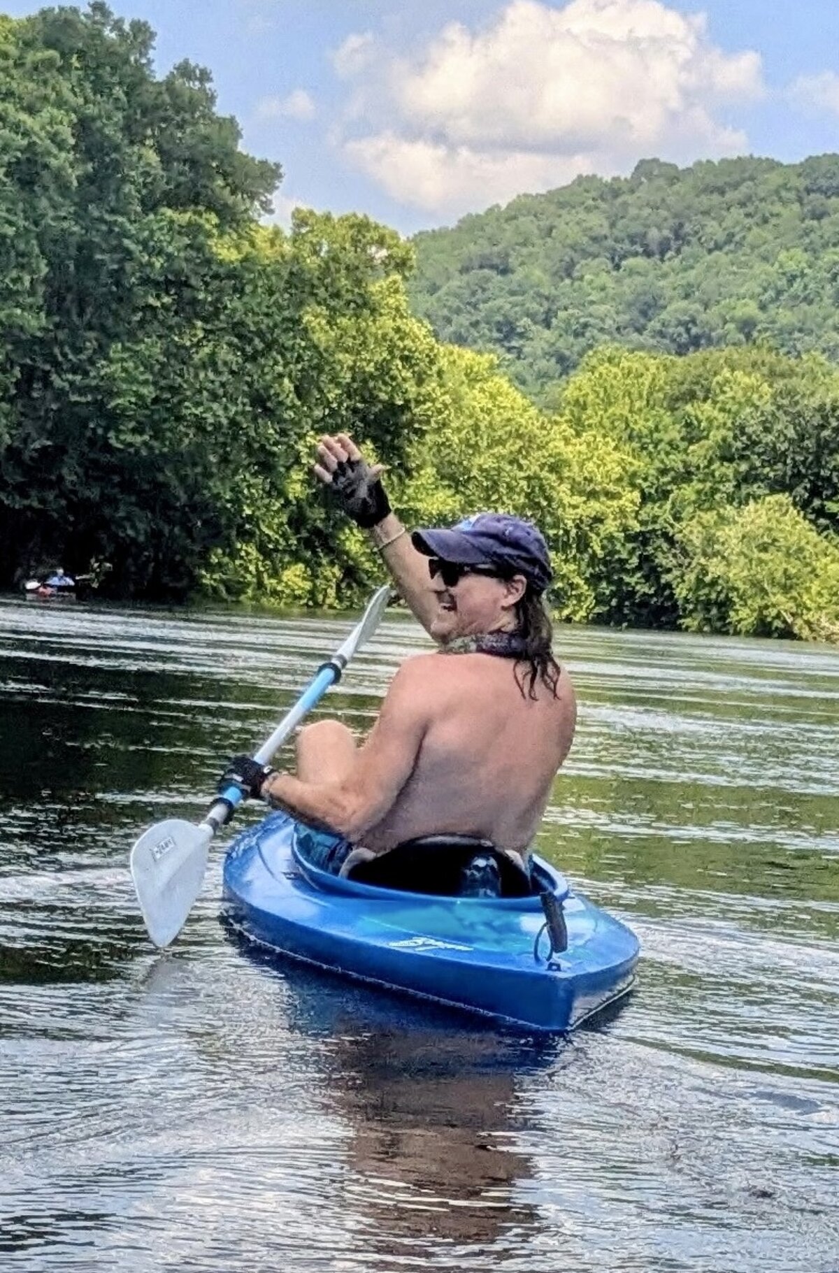Stevie kayaking on the river